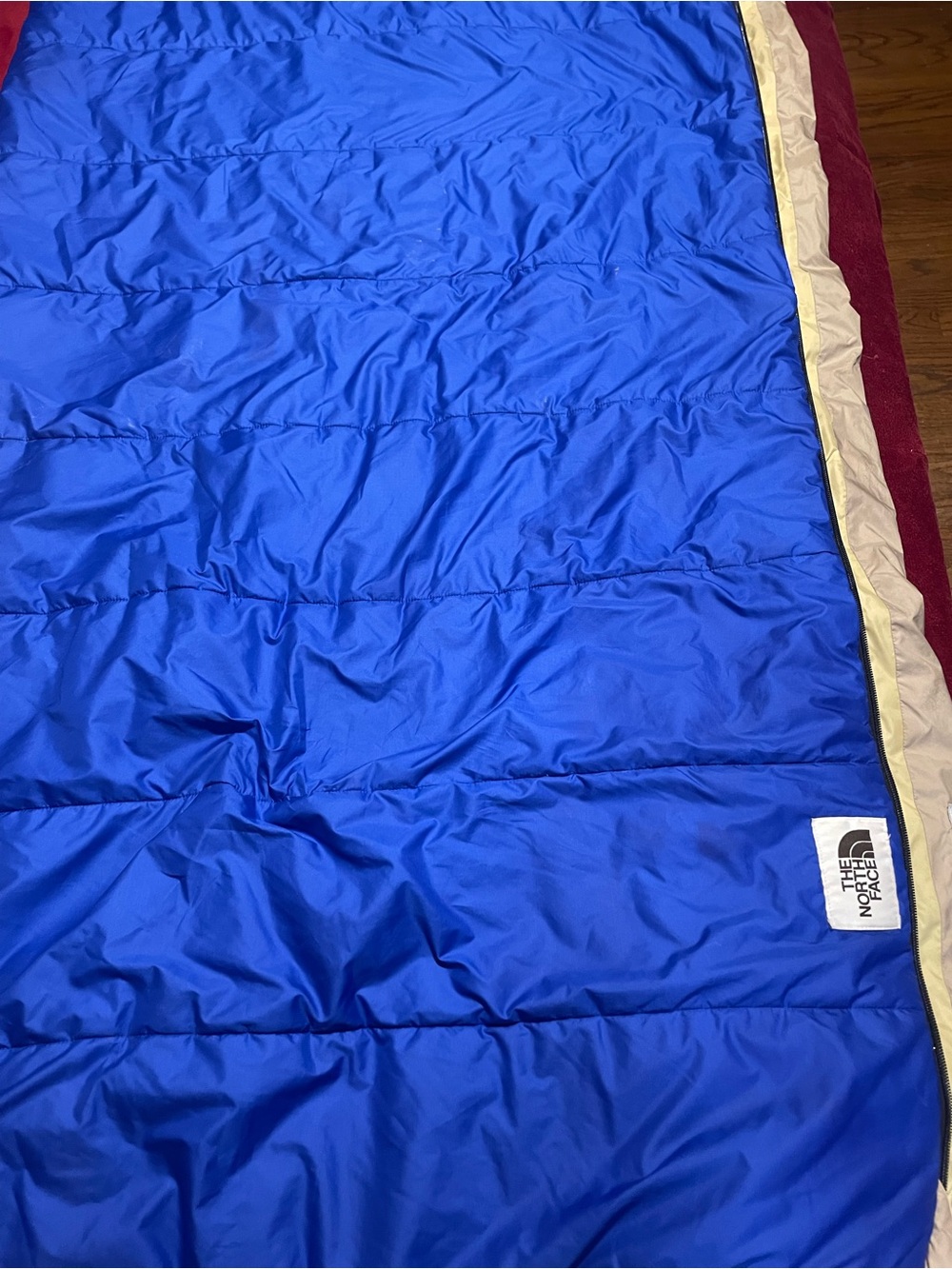 The North Face Royal Blue Sleeping Bag Blanket with Cream Trim